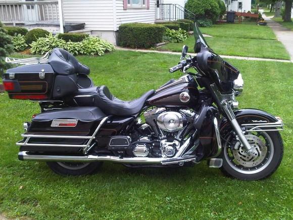 Loaded and ready to go to Put-in-Bay. Air shocks back on the bike. The lowered shocks were the same as a rigid frame. They would not compress at all. The guy I got this bike from did some weird stuff to it. 
5 minutes after this picture it started to rain and we rode wet for the next 3 hours.
