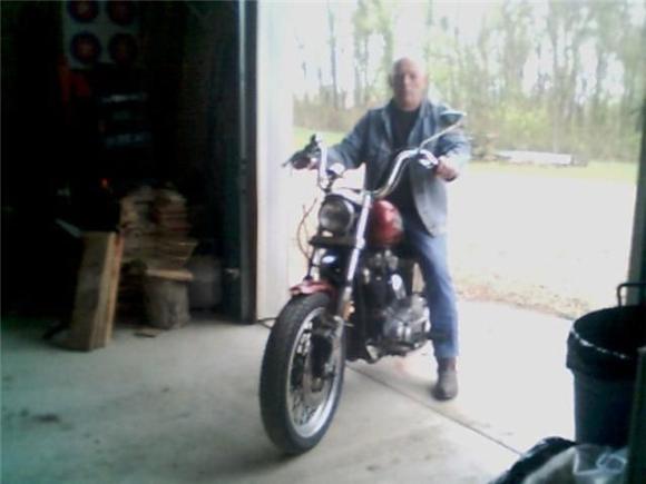 Not the greatest picture, but this is the only one I have of my dad and the bike.