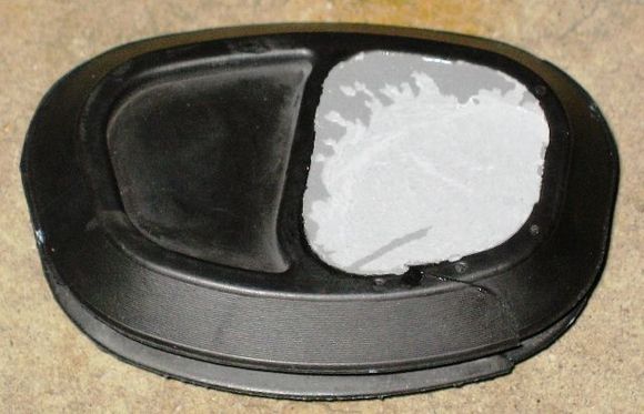 Making a grommet plug using JB Weld.  Info here: http://www.hdforums.com/forum/dyna-glide-models/165942-cleaning-up-the-wire-harness.html