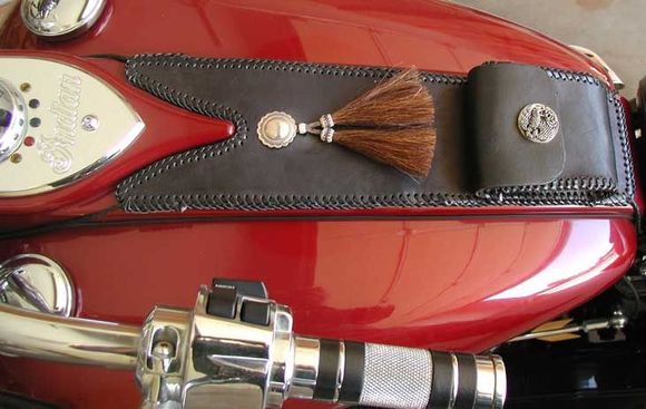 Tank bib, I made this myself. Purchased the leather, concho and pouch snap cover on Ebay.