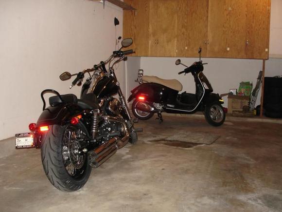 stock 2010 Wide Glide and 2006 Vespa GTS250