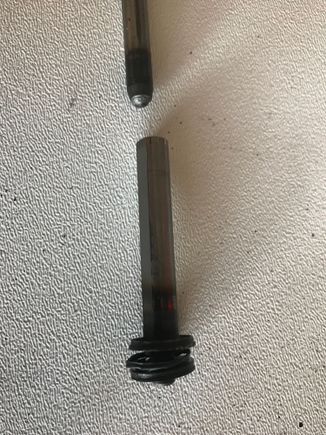 this piece was welded together.  I found the bearing in pieces and the one thrust washer welded on the ride side end piece also.