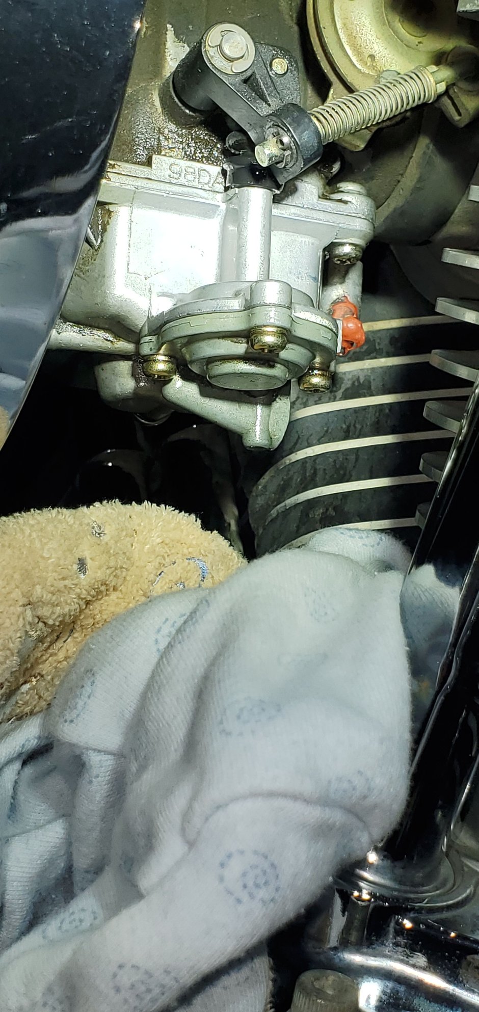 My throttle body is leaking gas when I pull back on throttle Harley