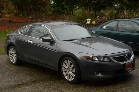 Took this the first day I had her. It was dark and rainy but for some strange reason its the only one I have. (impressive as I am a photo-major lol)