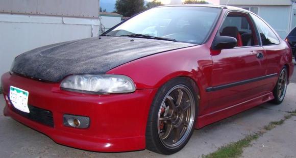 traded the hatch foe a 95 coupe, the carbon hood was painted black(rattle can) by previous owner..will be fixed soon..full turbo kit to be installed by next week...I got to keep my enkies