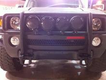 Black rhino lined grill, 4 fog lights, brush guard,