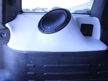 Custom Enclosure for the Rear Driver Side! No Cutting or Modification Required! Simply Remove the Storage Tray and Enclosure Slips Rights in. Also Accommodates Spare Tire!