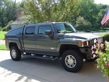 H3T topped by Snug Top keeps the design going and offers security (of sorts) for luggage, decoys or a trip to Sams Club.