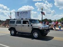 2005 Hummer H2 &amp; homemade banner stand mounted to roof rack...