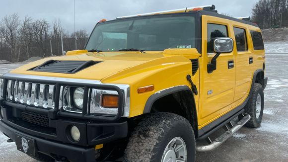 After touching up grill, bumper, rails. Looks better than factory!!! 185K Miles. Still more detailing to do. 