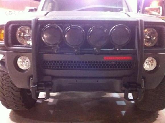 Black rhino lined grill, 4 fog lights, brush guard,