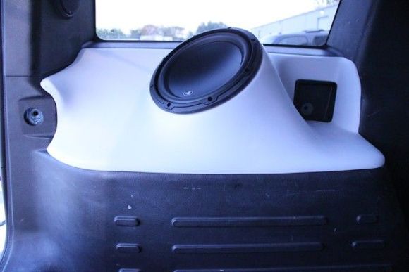 Custom Enclosure for the Rear Driver Side! No Cutting or Modification Required! Simply Remove the Storage Tray and Enclosure Slips Rights in. Also Accommodates Spare Tire!