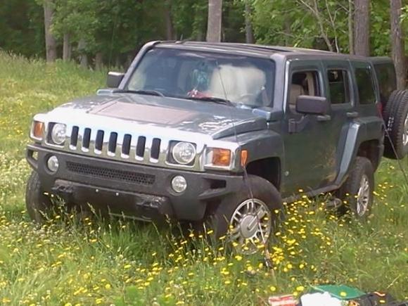 At secret pond!!!    I swear I love this thing,,I think it could climb a tree,but if I don't get this problem figured out soon,,,it may become fish structure...or A Jeep Unlimited!!!