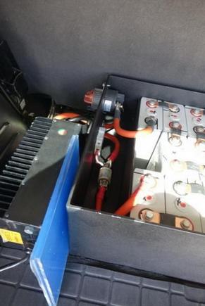 Viewing the battery pack charger in rear of vehicle