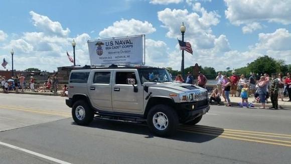 2005 Hummer H2 &amp; homemade banner stand mounted to roof rack...