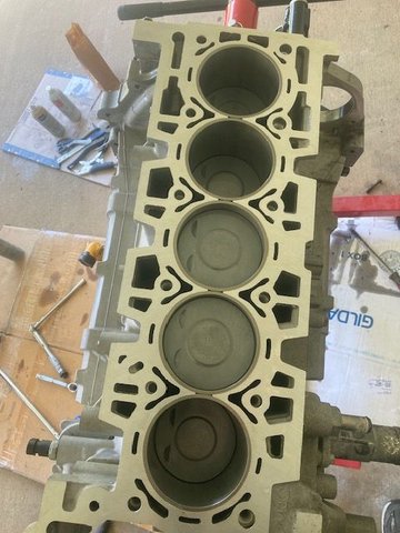 Piston Direction - Valve Grooves face exhaust side.  