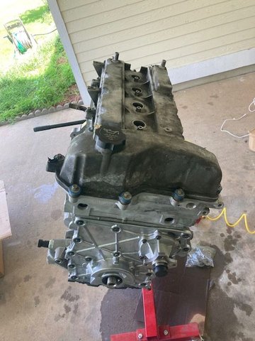 Valve cover installed - cleaning it was done in the same fashion as the oil pan (Gumout Regane parts cleaner, and a brass wire brush).  