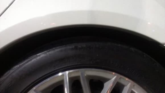 Closeup of the rear wheel gap after installing Eibach's Pro Kit lowering springs and upgrading one wheel size to a 17&quot; alloys. Total drop is 2 inches after 1000 miles to break them in. No rubbing even with a full car and loaded trunk.