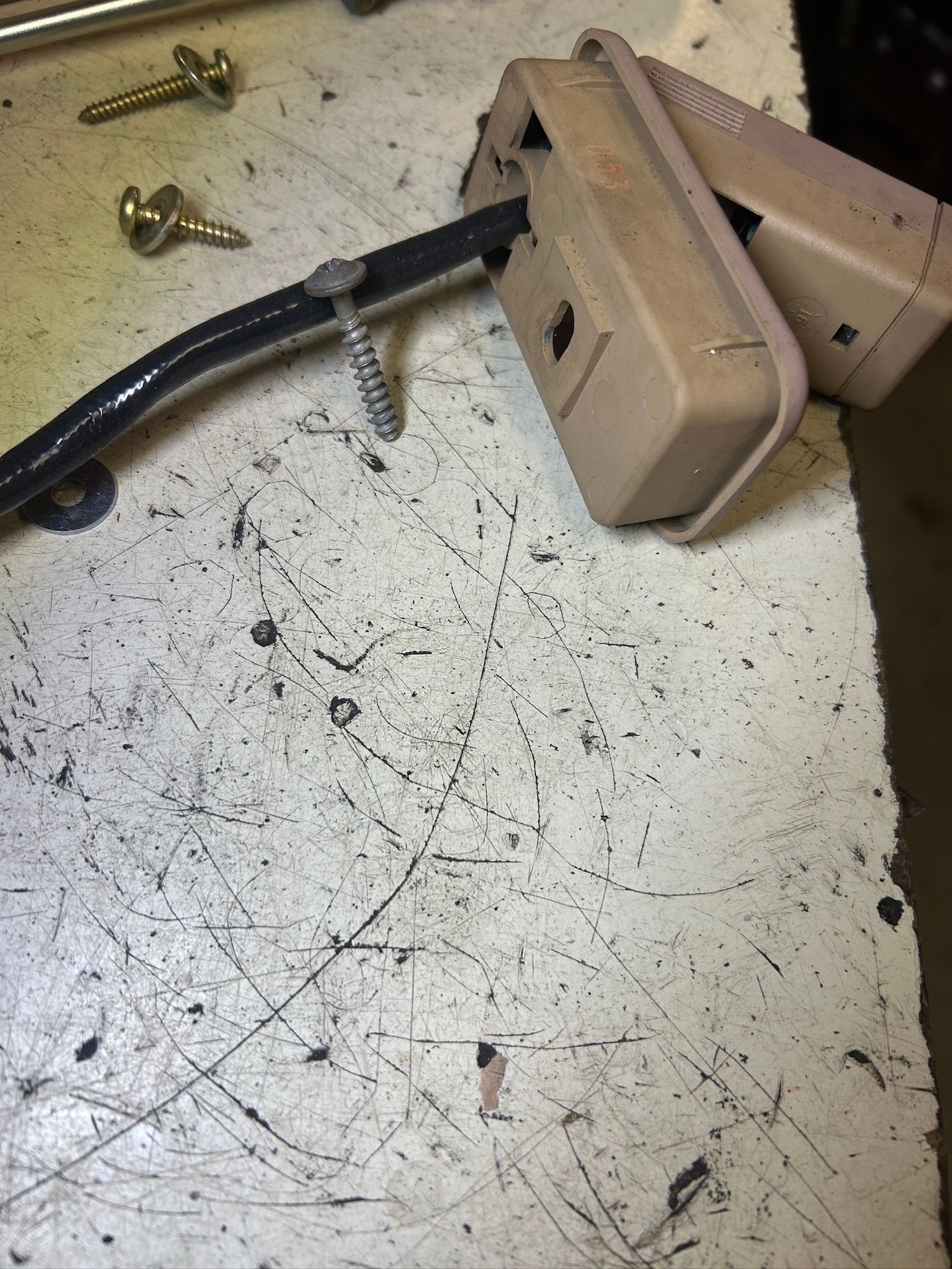 the phosphored screws are what I had intended to use, but the grayish one is the one that worked. It may be 1-1/2