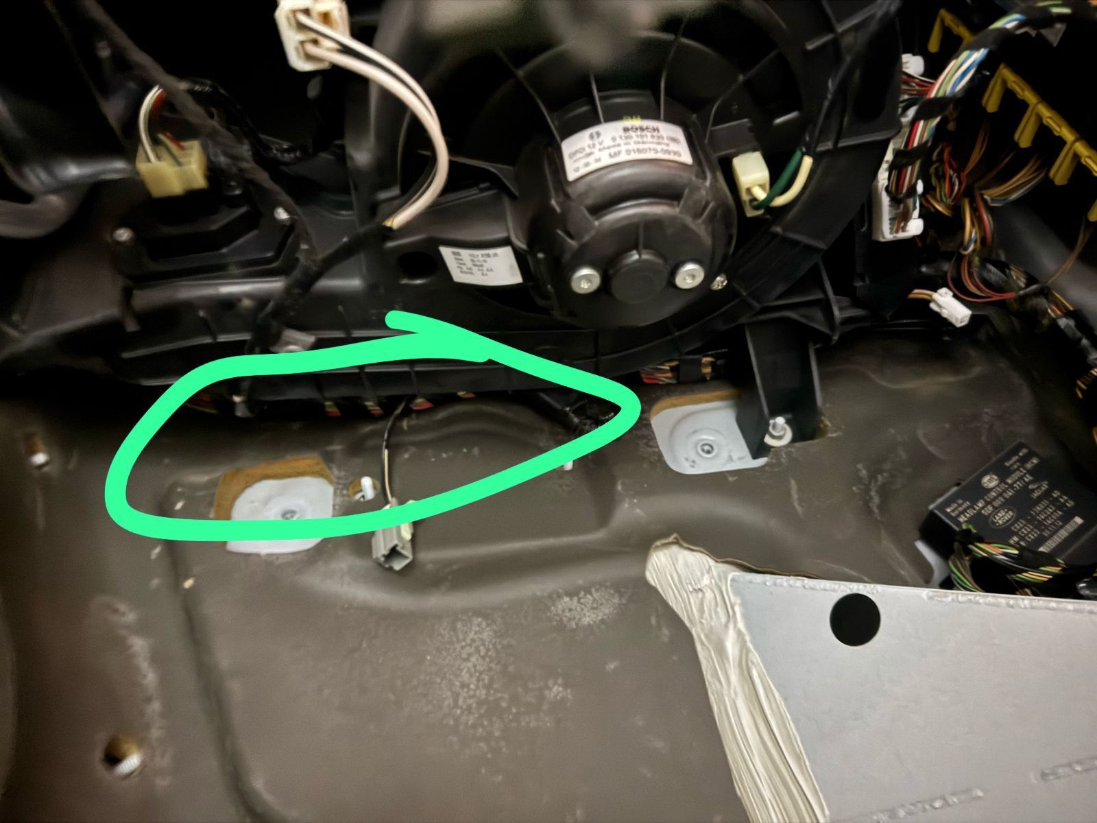 The location where the original power plug (CA115) is tucked away (it has a false female plug on it)