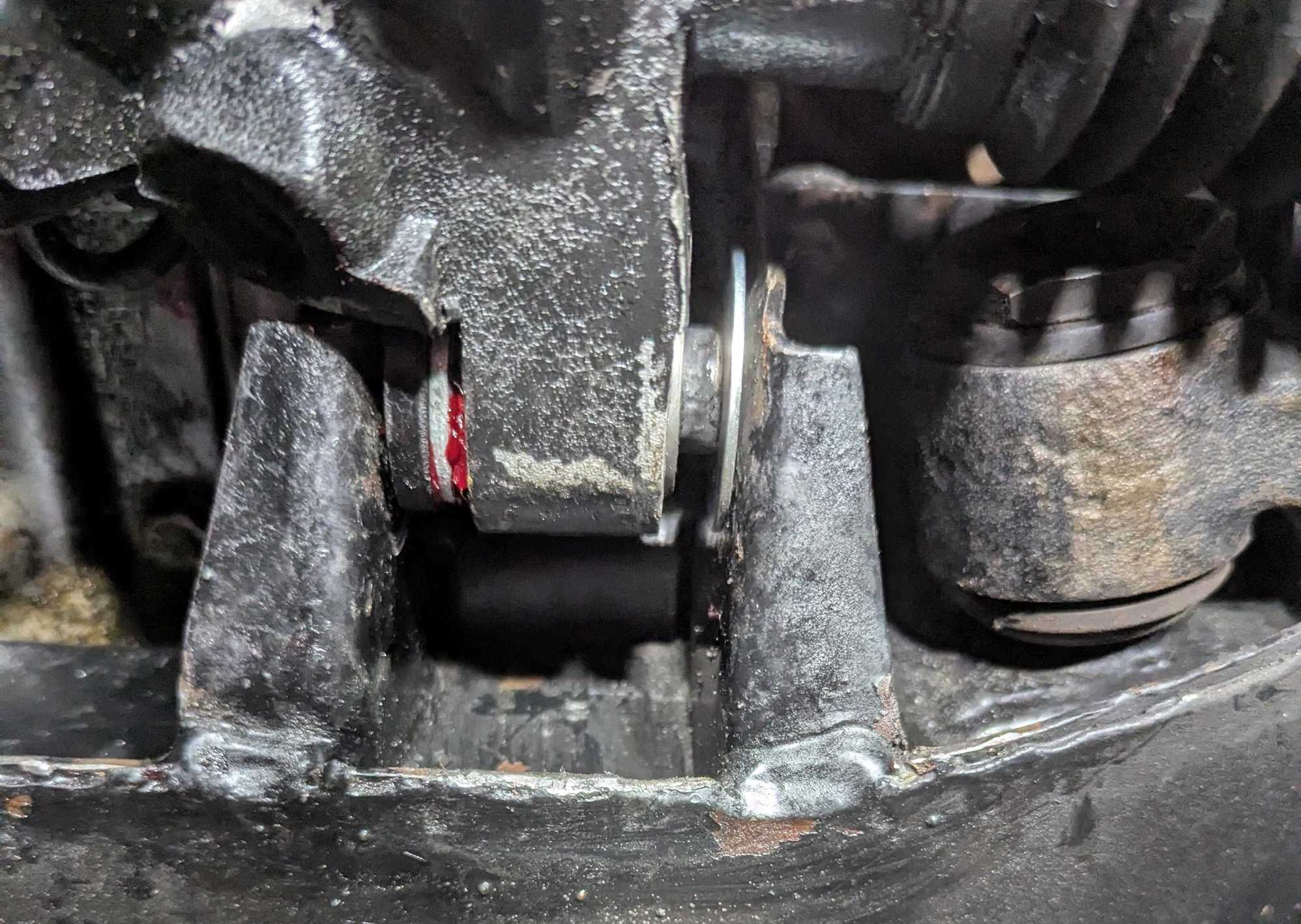 Thrust washer on the left side of lug.