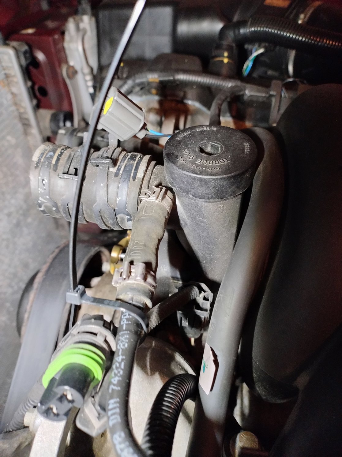 Fan cables attached. You dont need to remove the crossover pipe, but I was also replacing the Thermostat tower.