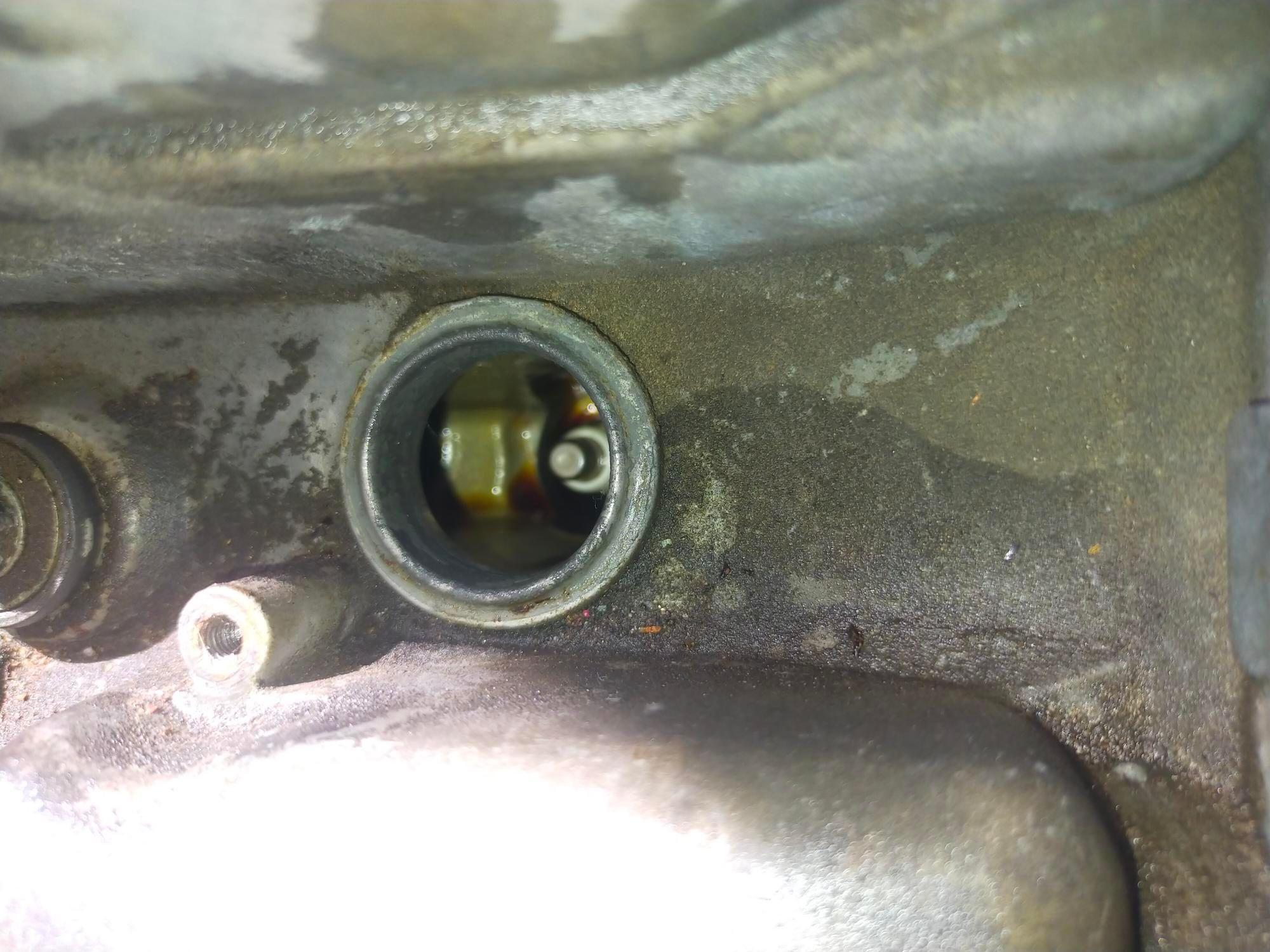 Oil inside spark plug well when i started