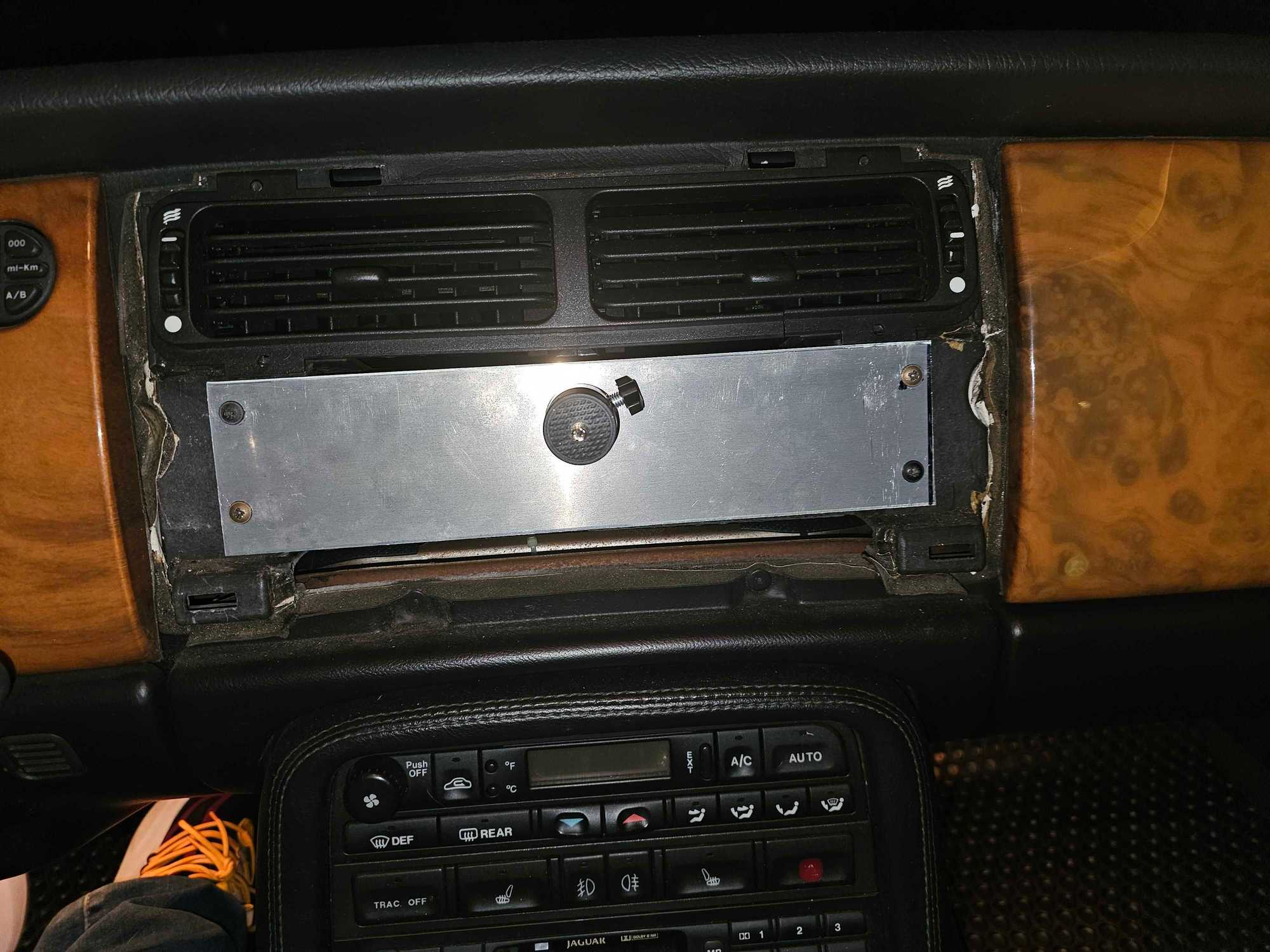 thick Aluminum plate (behind is the power supply, switched, wired into the old GPS harness), acts as heat sink