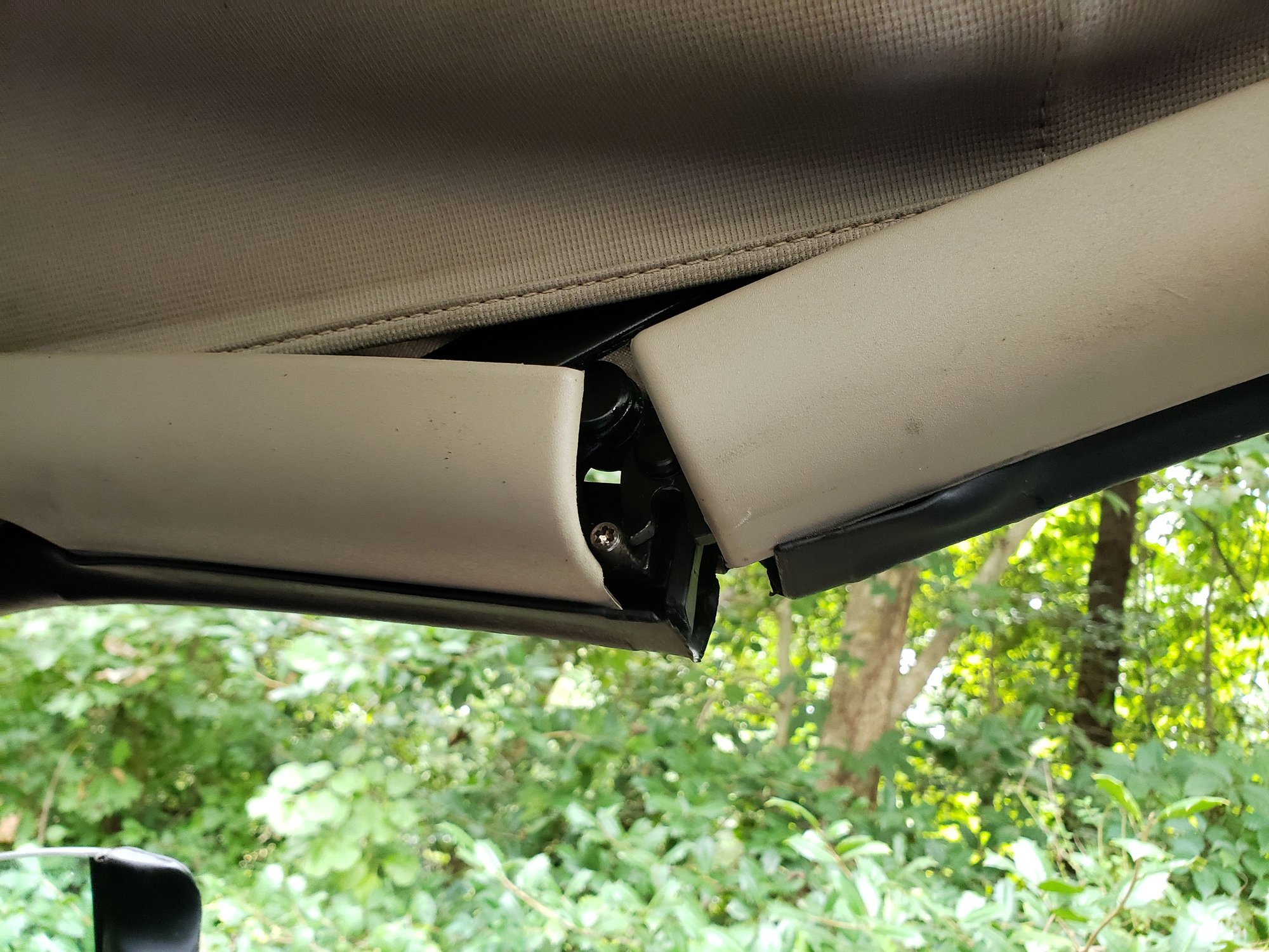 Left side convertible fold point showing guide pin
