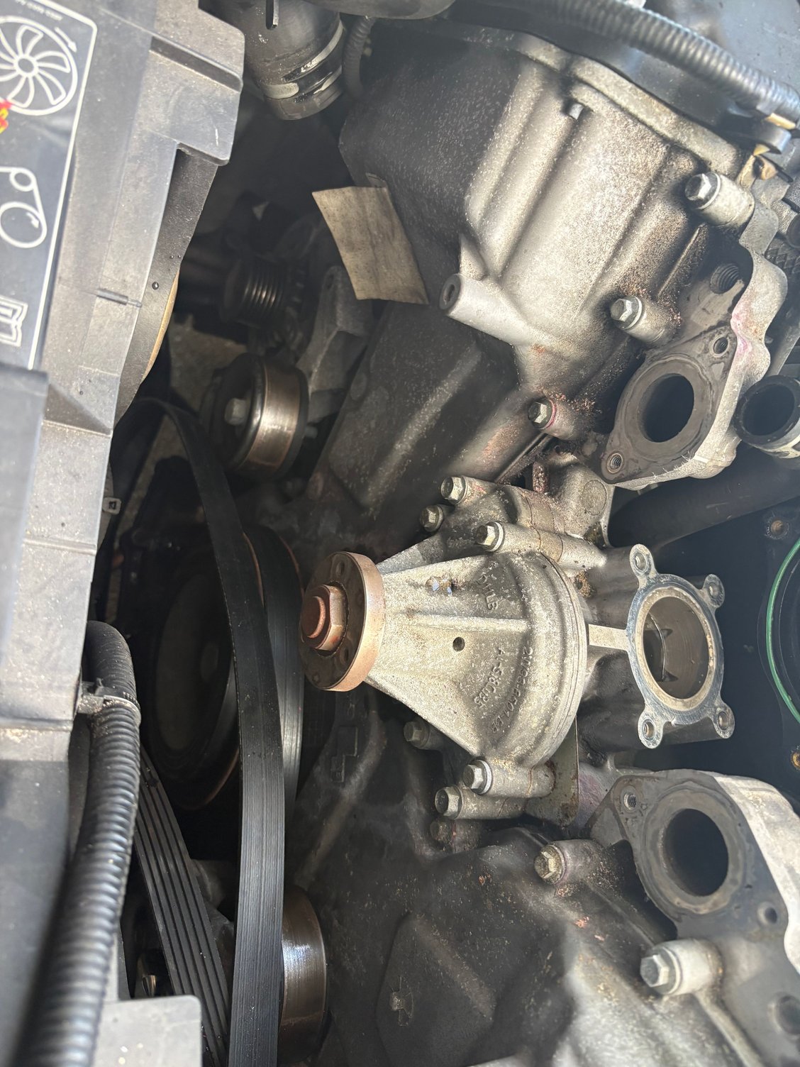 While I was in there, I replaced the water pump. Super simple. It took ten minutes.