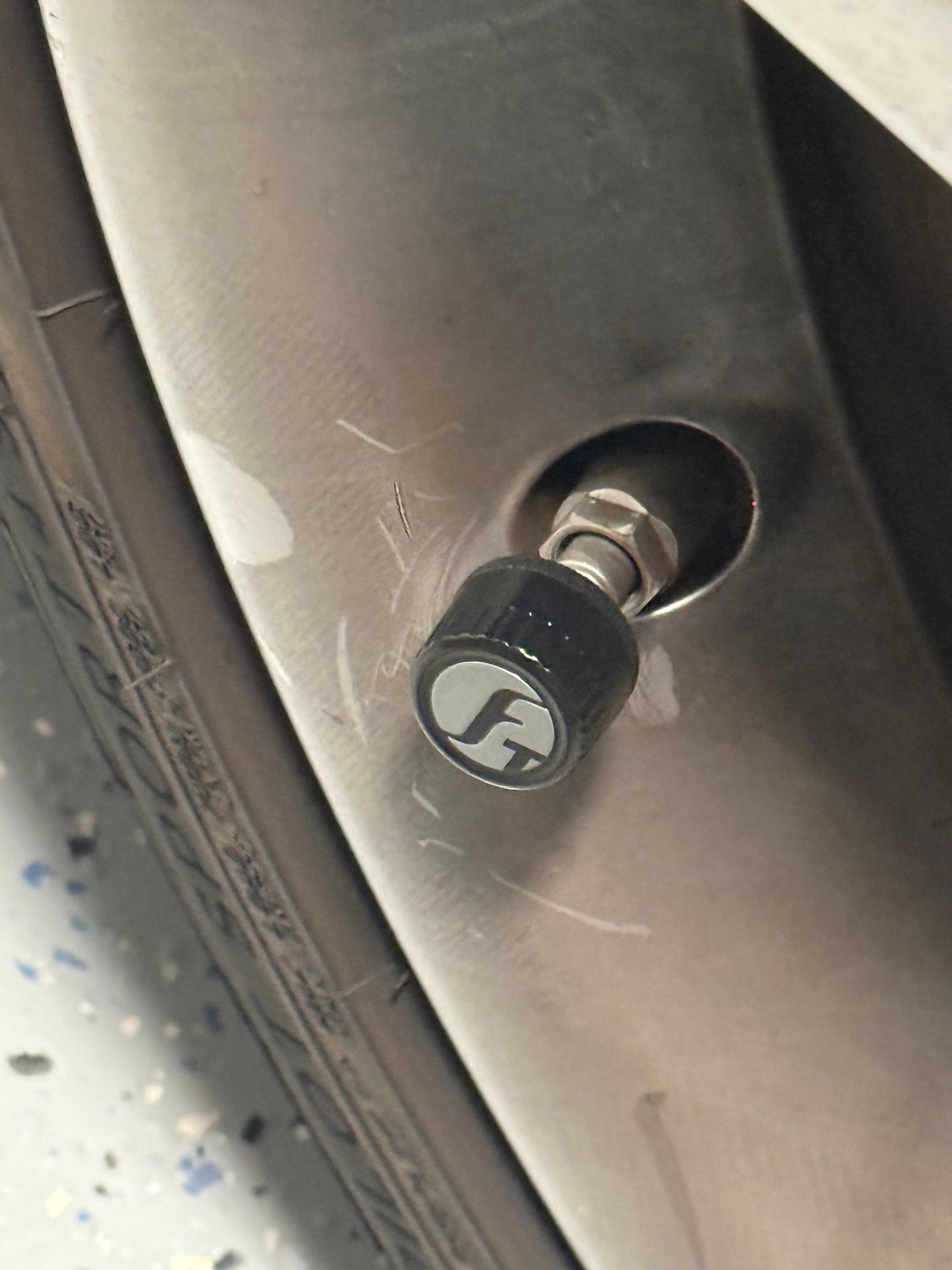 The tire stem sensor…forgive the brake dust.