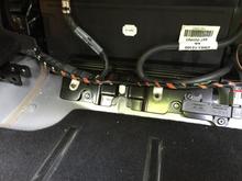 16. Only the two nuts next to the cables come out.