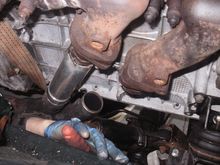 I have taken the two front 'cats' away as  apart from being a restriction, the front one was touching the metal pipes on the power steering