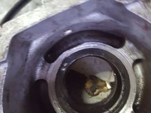 See black ring around this rear view. Is the black metal part permanent or press it out?