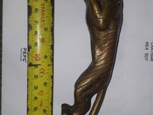 Hi all ,wondered if anyone can help, my late father, bought home this leaper over 50 years ago from a jaguar that was being scrapped. It has sat in the loft for years, however its design is unusual, particularly the upcurl of the tail, and the stripes as opposed to spots (which on close inspection have original casting marks) I would be grateful if anyone can shed any light on it. Have other pics if needed
Kind regards Graham