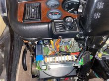 Blue hose visible next to the round black relay, headed upwards.