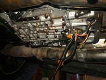 With everything removed. Some great videos on YouTube that show how each solenoid comes out. 