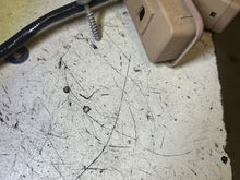 the phosphored screws are what I had intended to use, but the grayish one is the one that worked. It may be 1-1/2" long. 