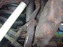 Saving myself a lot of pain and suffering by cutting the Steering Arm through with a Small Angle Grinder.