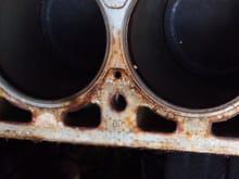 brown discoloration on block around cylinder number three 