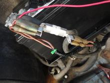 The direct battery feed for the Main relay and the Pump Relay are the two seen at the right of the spur connections.
