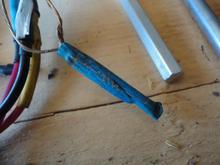 Notice the crumbled insulation on wires leading to and from this resister