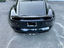 The rear is completely debadged and the tail lights tinted.