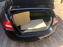 Original mats and additional floor mats included.  Carpeted trunk mat and windshield sun visor (both custom and specific to car) included.