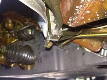 Camera position just behind left front wheel looking 45 degrees forward. The brownish stuff is the anti-corrotion material.