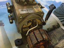 Notice the motor is held in place by four Torx 25 bolts.