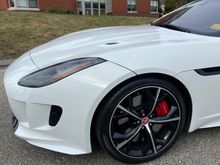 It was the calipers on my first F-Type that I painted and added new decals.  This style rim allowed me the space to pull it off without removing the wheel but I still had to move the vehicle a few times.  Would not attempt it with the rims on my newest F-Type.