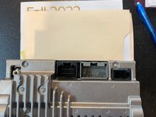 Audio module rear connectors with 3 multi-pin connectors and Fakra coax connector. Module is upside down to get a picture of the connectors. 