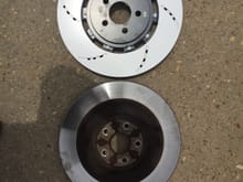 Rear rotor OEM V/S www.racingbrake.com
rotor.  Yes the rotor is silver painted