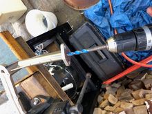 10mm x 150mm drill bit trying to track through to the manifold header. Totally blocked, near vertical flange.